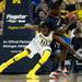 Michigan junior Tim Hardaway Jr. dives for the ball in the game against Illinois on Sunday, Feb. 24. Daniel Brenner I AnnArbor.com